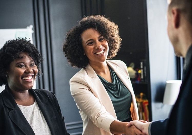 Company Secretary & Businessman Shake hands